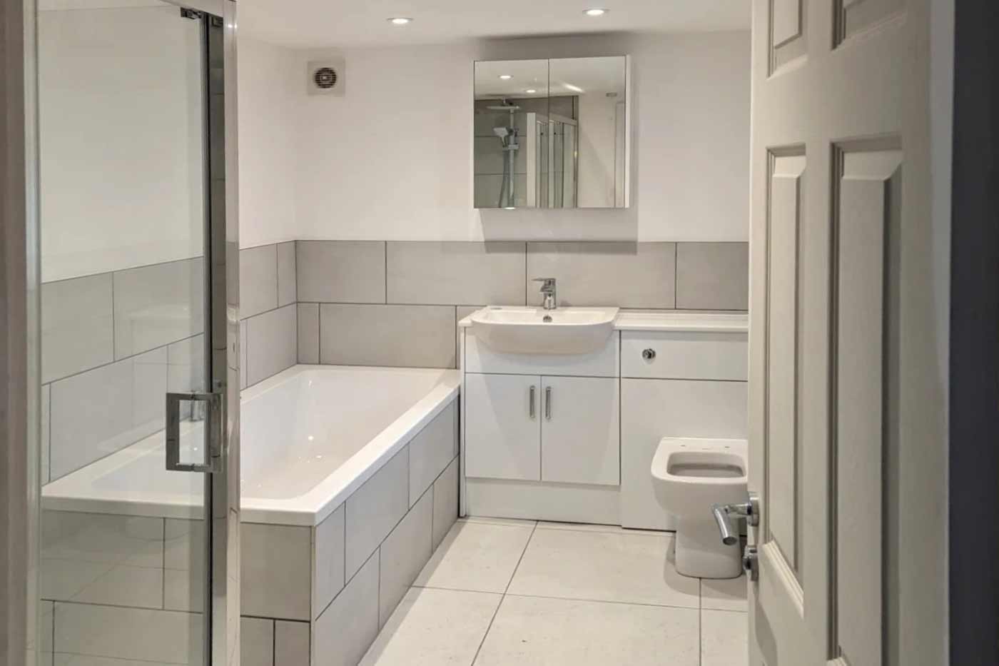 A newly installed bathroom suite by Prima Construction, professional bathroom fitters in Stockport.
