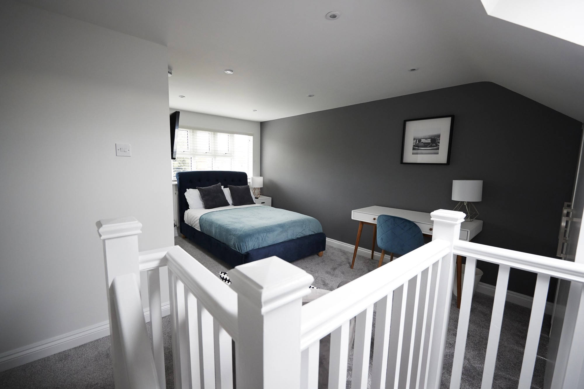A completed interior of a roof conversion in Stockport by Prima Construction