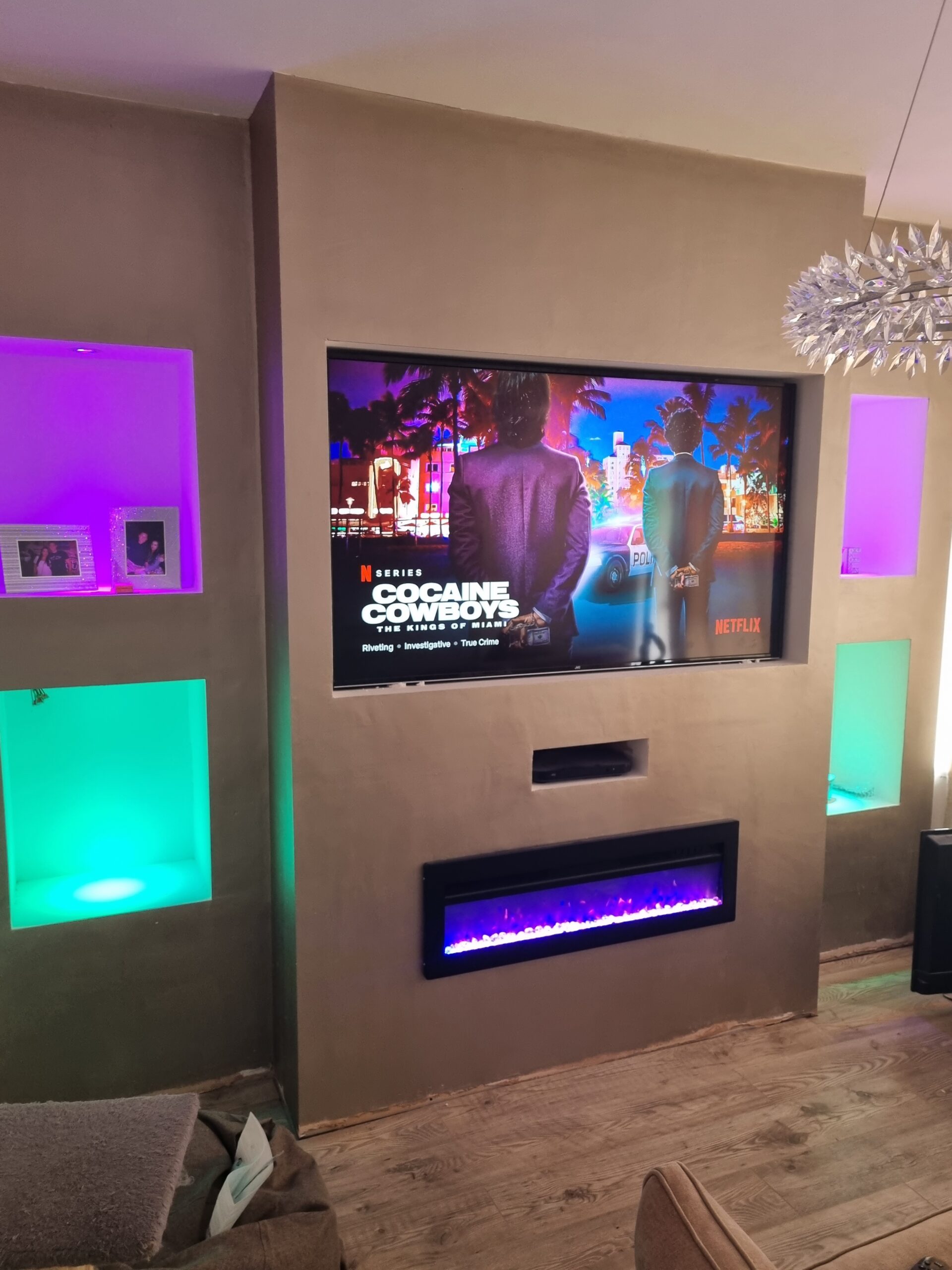 Media Wall with coloured LED backlighting installed in Stockport by Prima Construction