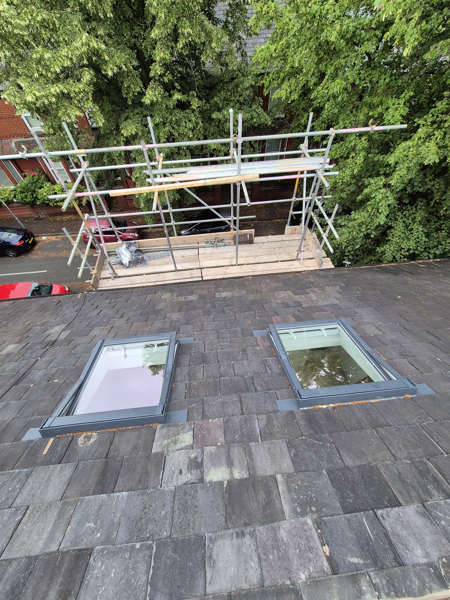 Velux window installation in a slate roof by Prima Construction Stockport