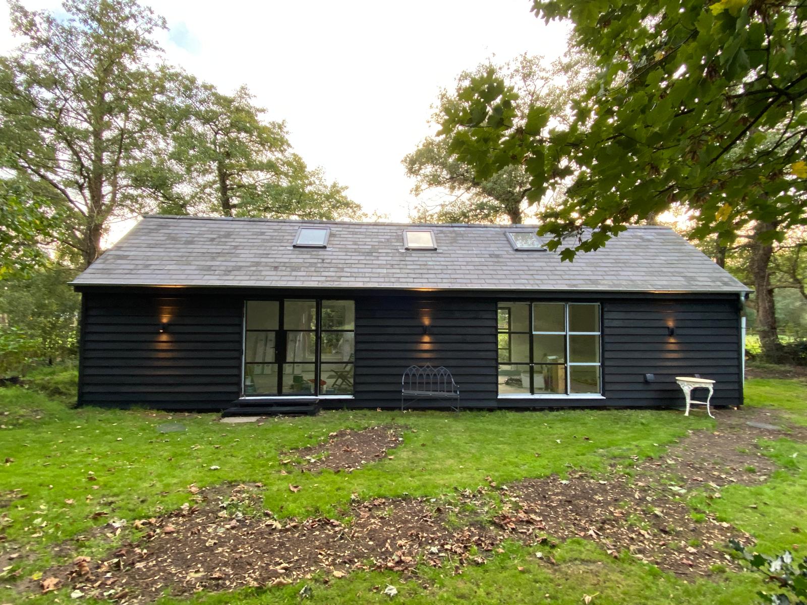 Traditional wooden barn style garden room build by Prima Construction in Stockport